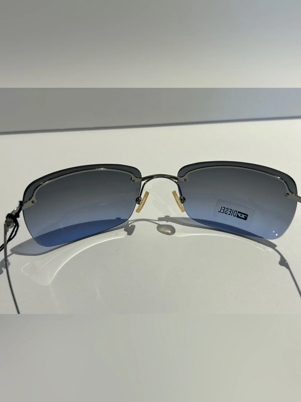 Diesel Gunmetal Frame Blue Gradient Lens Rimless Sunglasses -Kusini